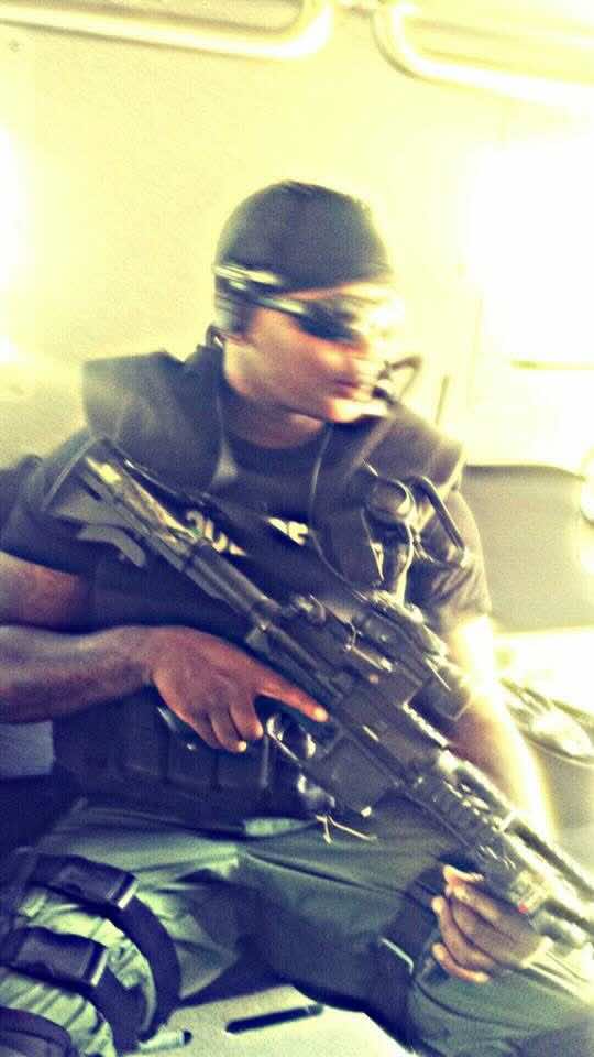 R.T. Oliver in tactical gear during military service